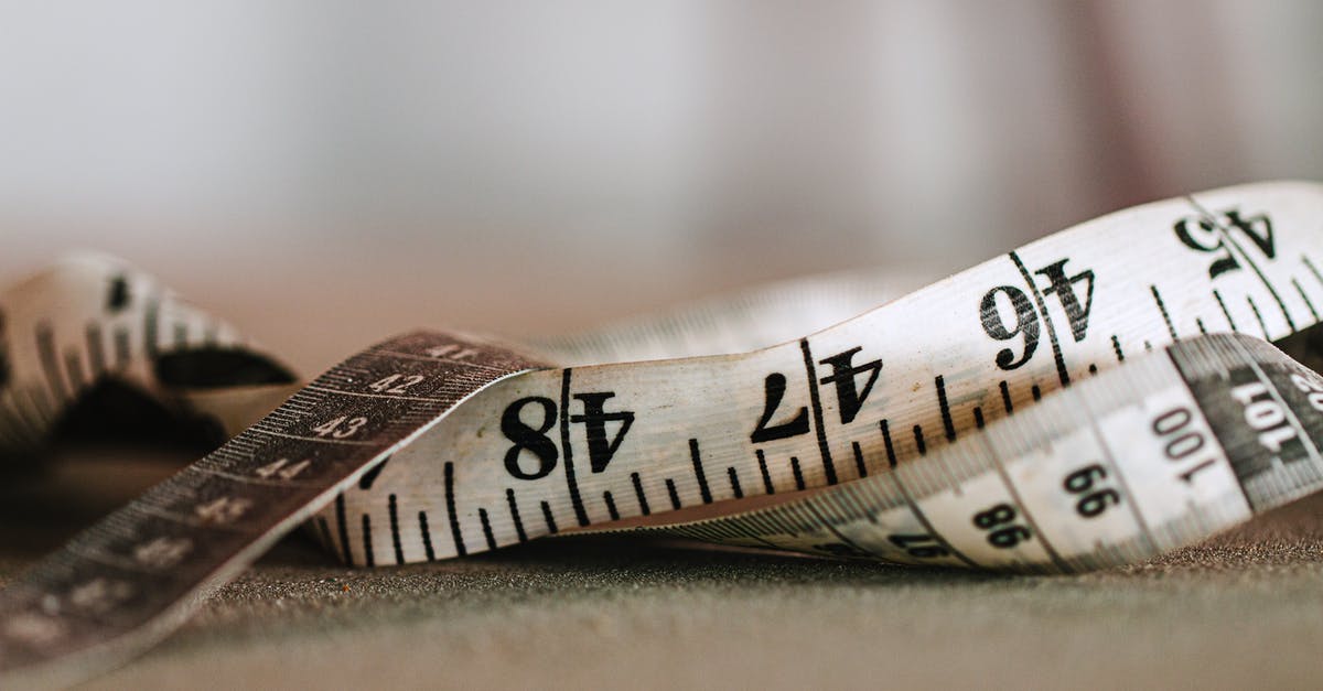 36 inch by 36 inch counter depth refrigrator [closed] - Close-Up View of a Tape Measure