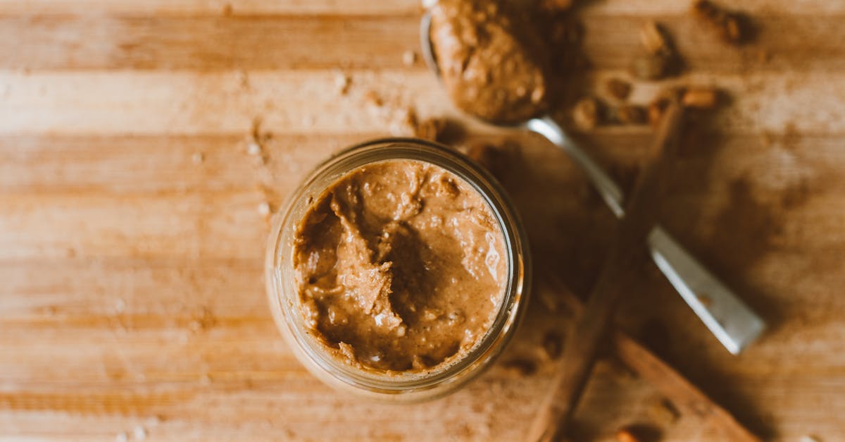 800g of peanuts give 700g of peanut butter – why? - Peanut Butter in Clear Glass Jar