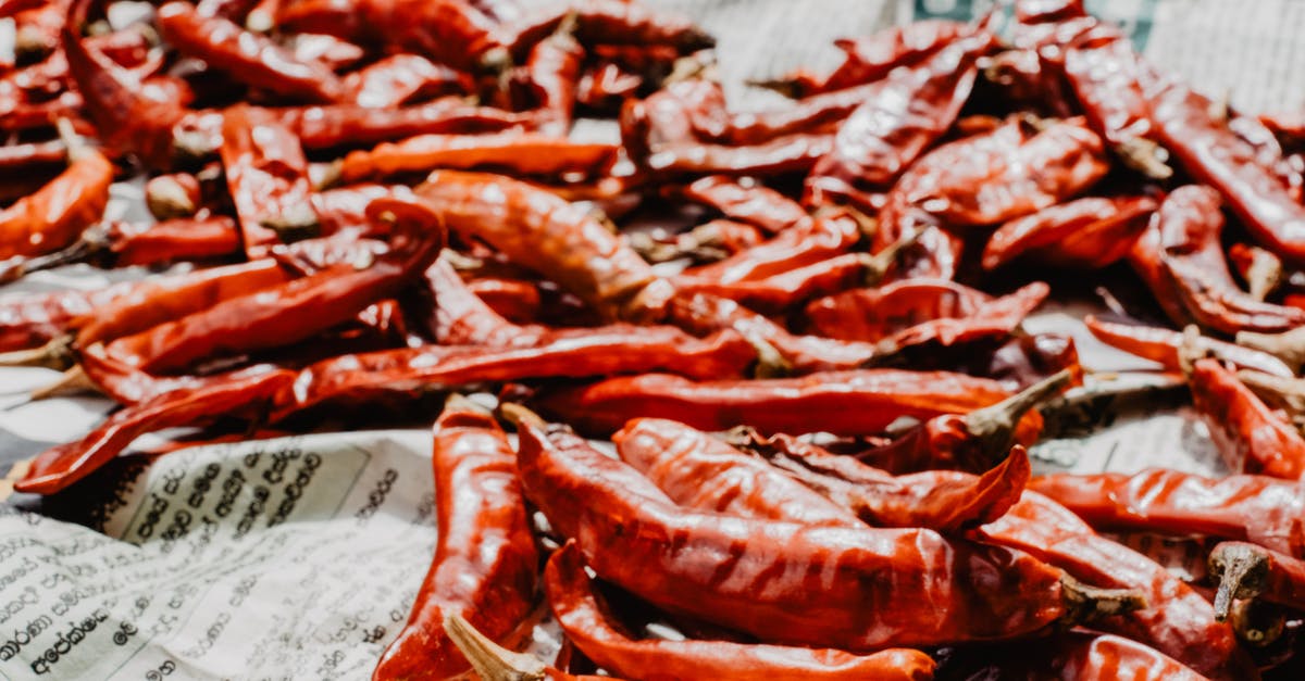 A spicy vegetable which stays in a sandwich? - Close up of Red Peppers