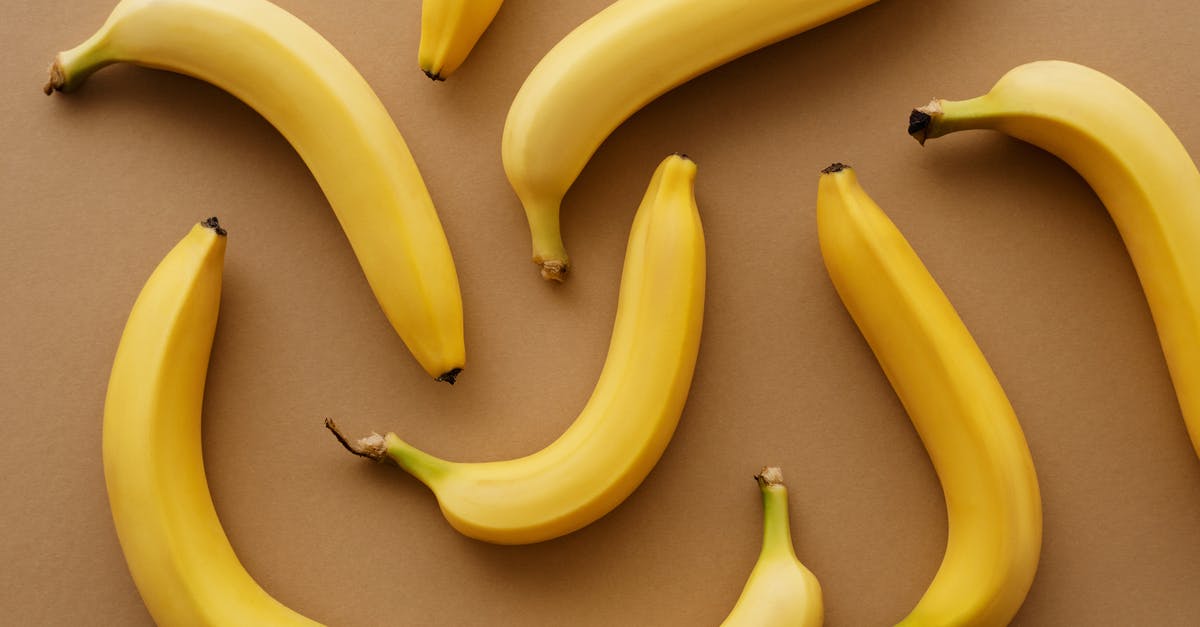 About ripe bananas for banana bread - Yellow Banana Fruits on Brown Surface