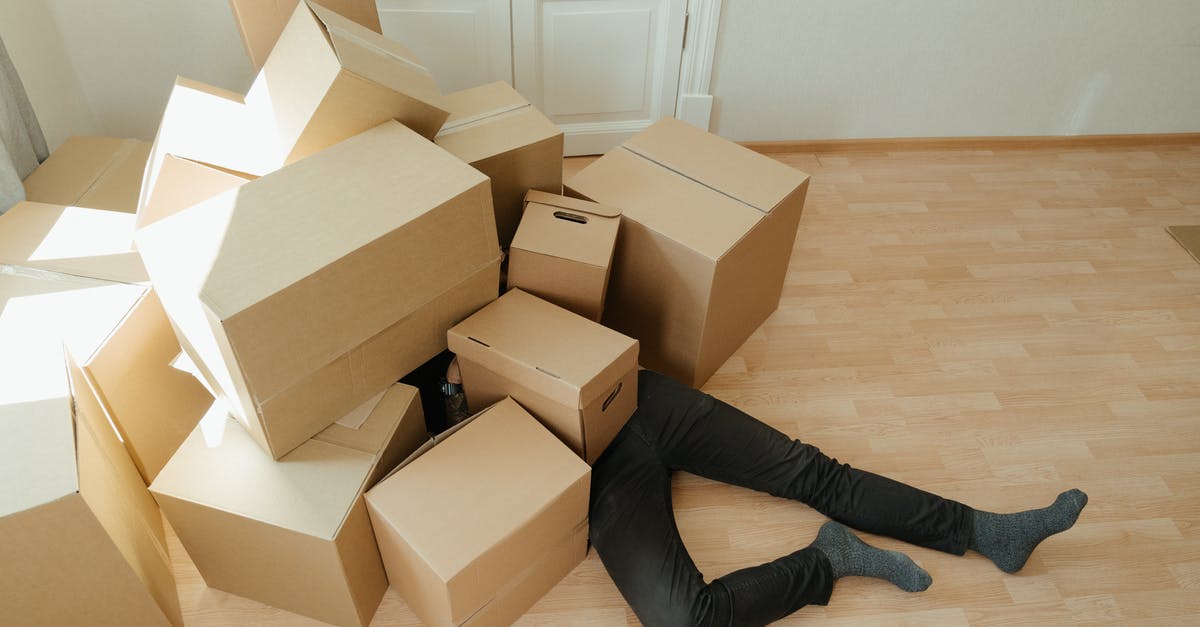 Accidently mixed instant and cooked pudding packages - Brown Cardboard Boxes on Brown Wooden Floor