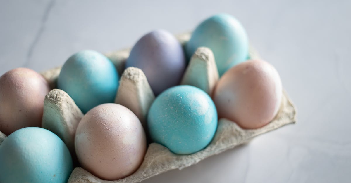 Adding eggs to lasagna - Blue Egg on Brown Egg Tray