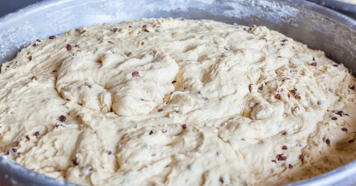 Adding Instant Yeast to dry bread mix for later use - Fresh dough with nut pieces in bowl