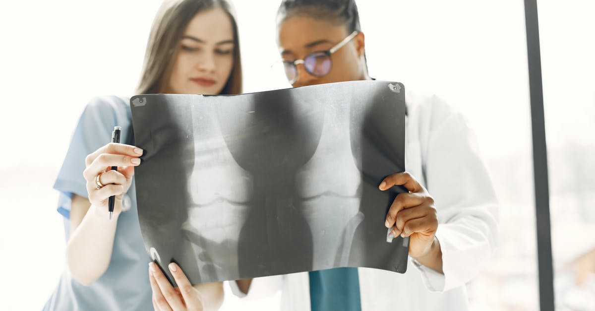 Adding more bones to a finished stock? - Two Doctors Examining an X-Ray Film