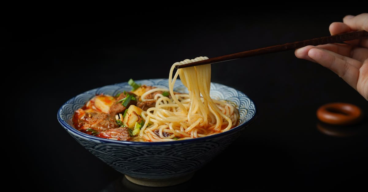 Adding Noodles to Soup - Cooked Ramen