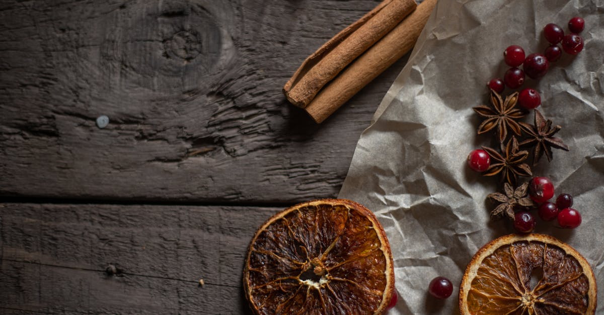 Adding spices before or after frying? - Sliced Orange Fruit Beside Brown Paper Bag