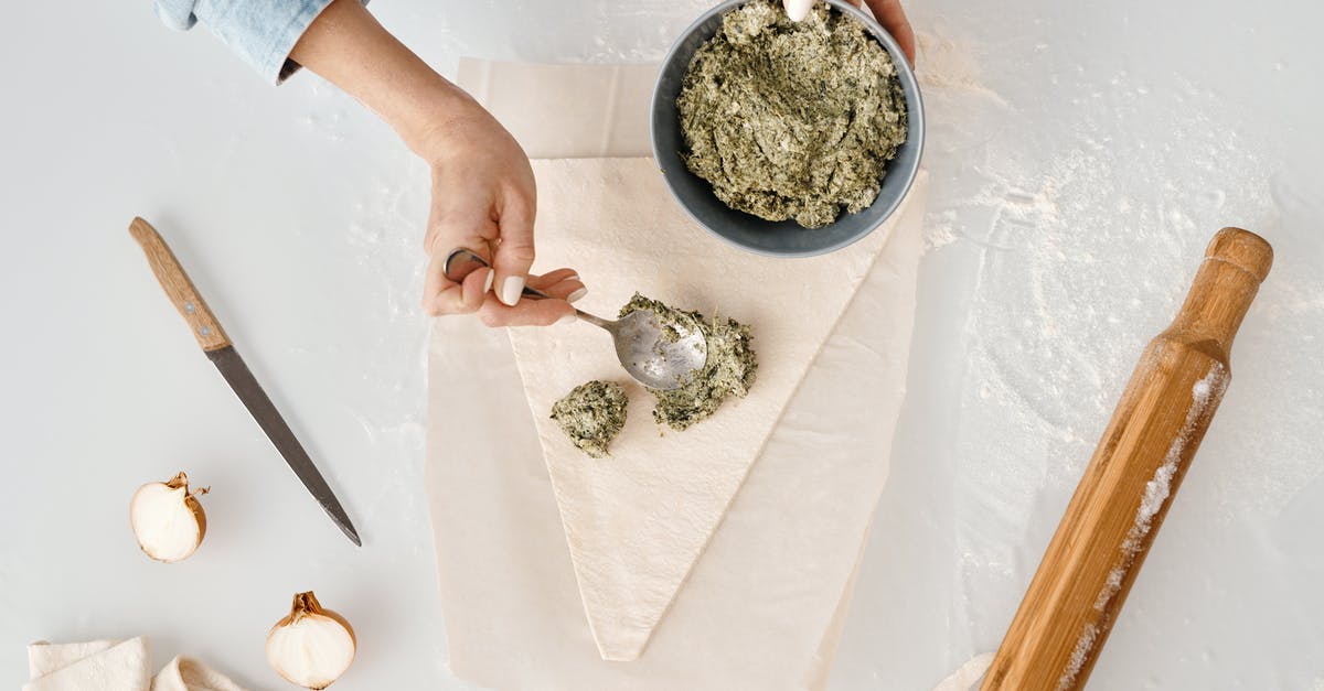 Adding/substituting non-flour ingredients in bread - Person Making a Christmas Tree Shaped Bread With Fillings