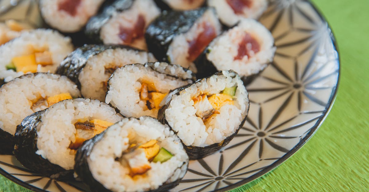 Adjusting an instant-rice recipe for regular rice - Delicious sushi on plate on table