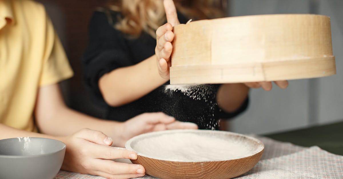 Adjusting dessert recipes to accomodate a larger slow cooker - Unrecognizable little children sifting flour together