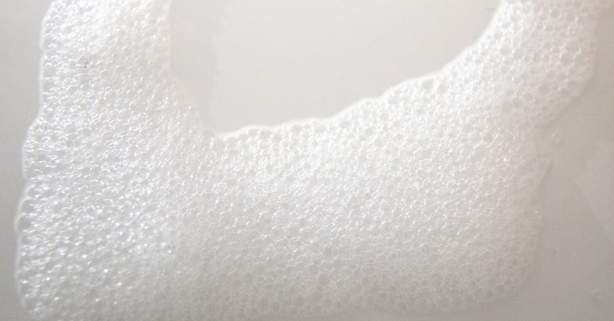 Air bubble on surface of chocolate - Abstract background of white foam on smooth surface