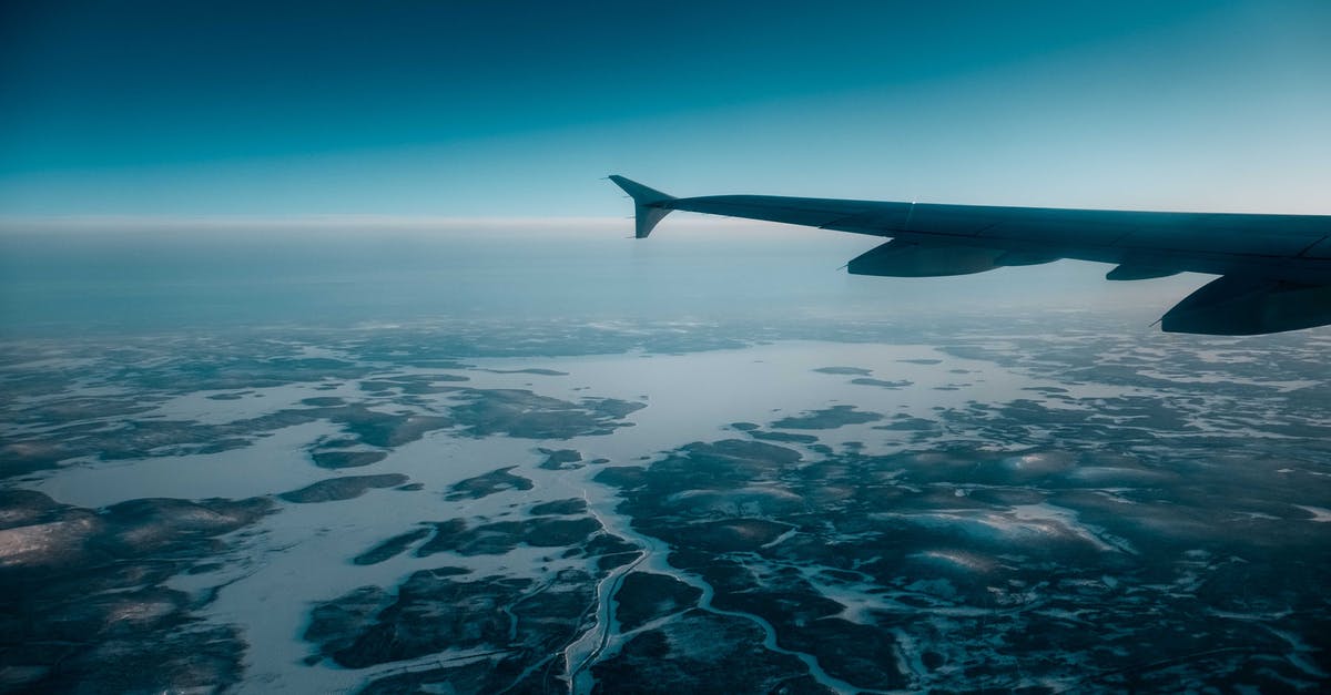 Air dehydrating ambient air temperature? - Airplane wing over snowy terrain