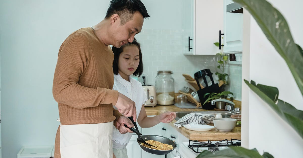 Alkaline cooking - A Man Teaching his Daughter how to Cook Scrambled Eggs