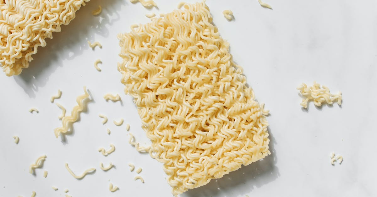 Alkaline ramen noodles shelf life in uncooked state - Photo of Uncooked Noodles on White Background