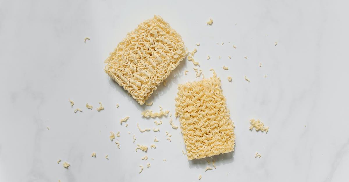 Alkaline ramen noodles shelf life in uncooked state - Photo of Uncooked Noodles on White Background