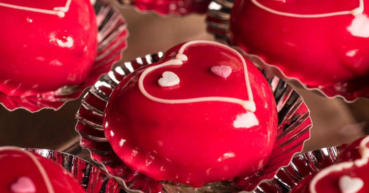 Almond pound cakes erupting - Red and White Round Cake