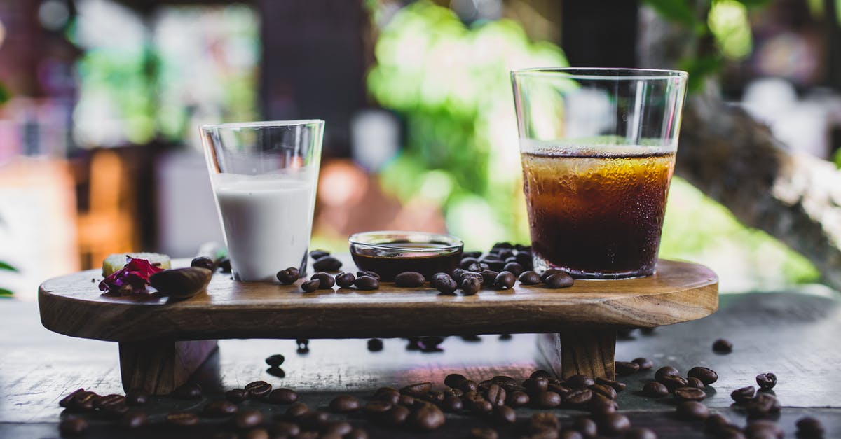 Alternative milk Bean curd - Glass of cold coffee served with milk and beans