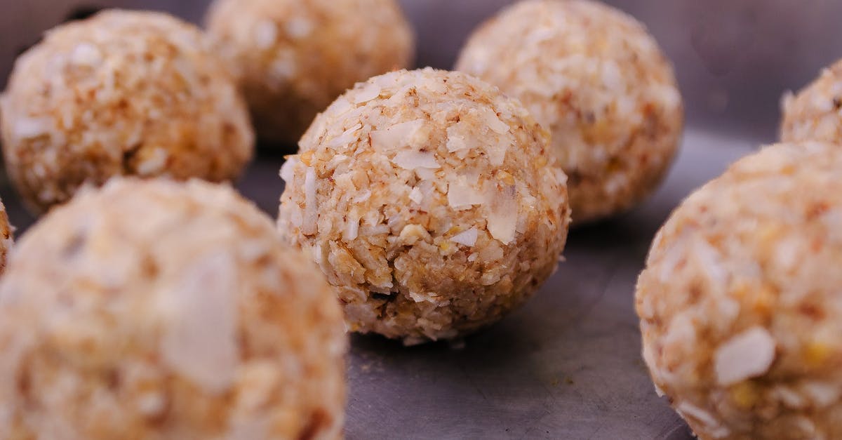 Alternatives to borax for minced protein recipes (fish balls, kebabs, etc.)? - Uncooked round meatballs on metal tray