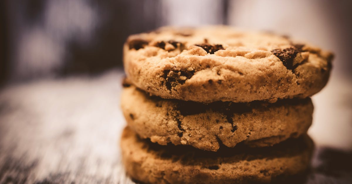 Amount of Chocolate-chips in a Chocolate-chip cookie? [closed] - Macro Photography of Pile of 3 Cookie