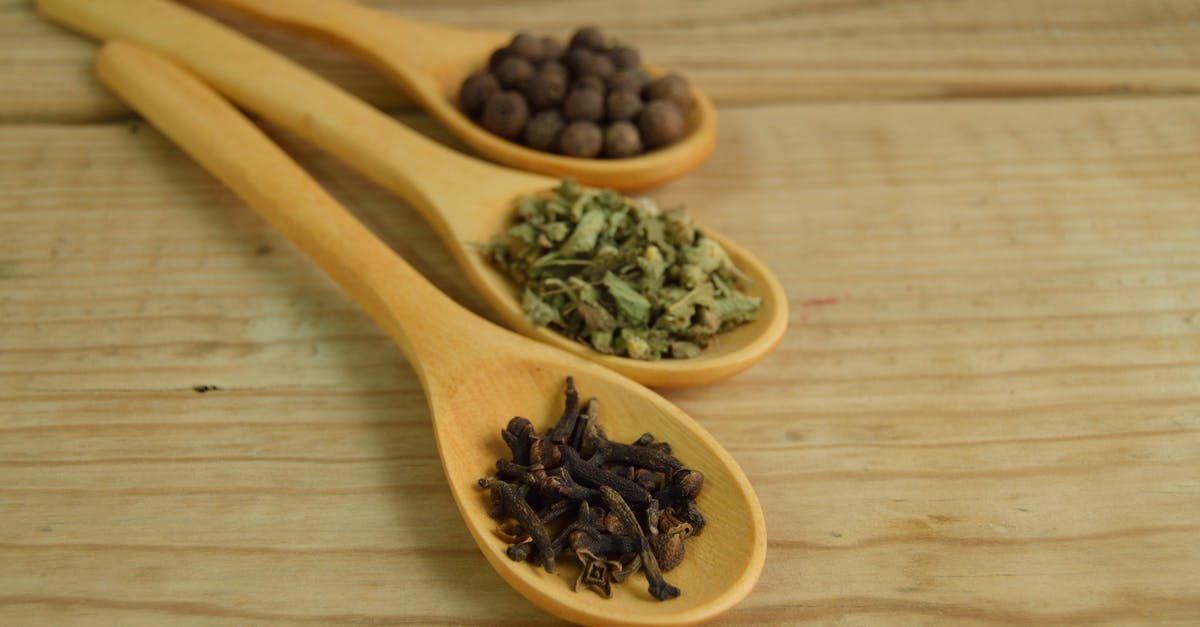 Anise, Pepper, Cinnamon, Cloves and Fennel better known? - Vegetables and Beans on Brown Wooden Measuring Spoon