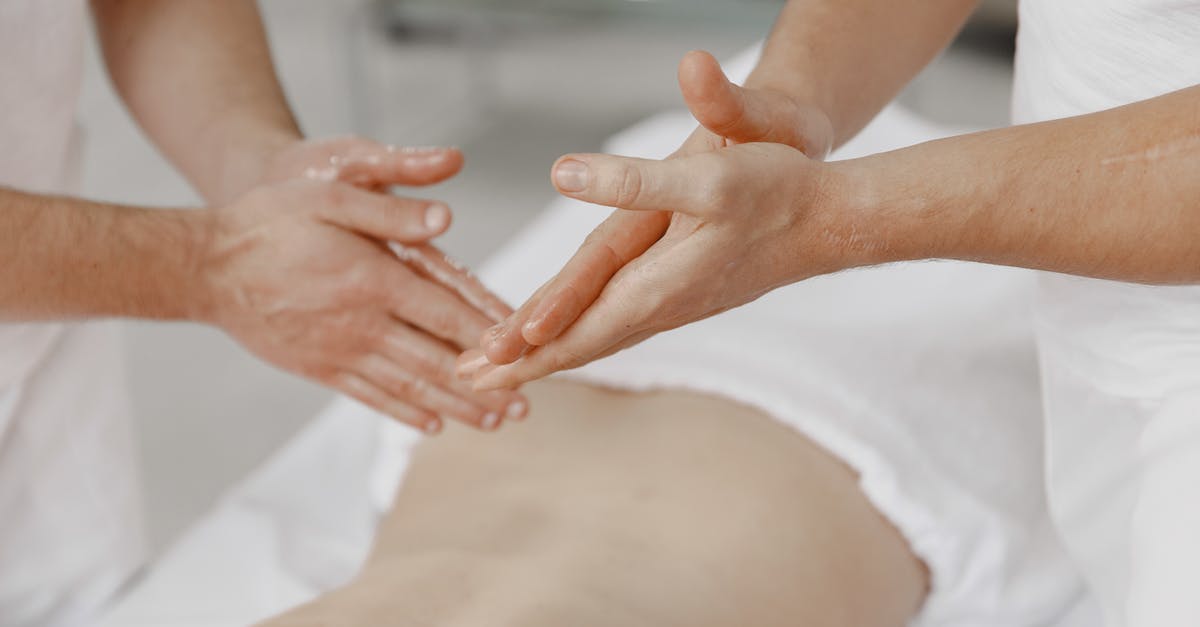 Annatto Oil Substitute - Masseurs Applying Oil on Their Hand