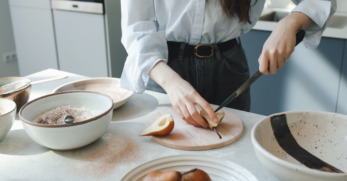 Any tips on how to cook gruel? - Woman in White Long Sleeve Shirt Holding Chopsticks