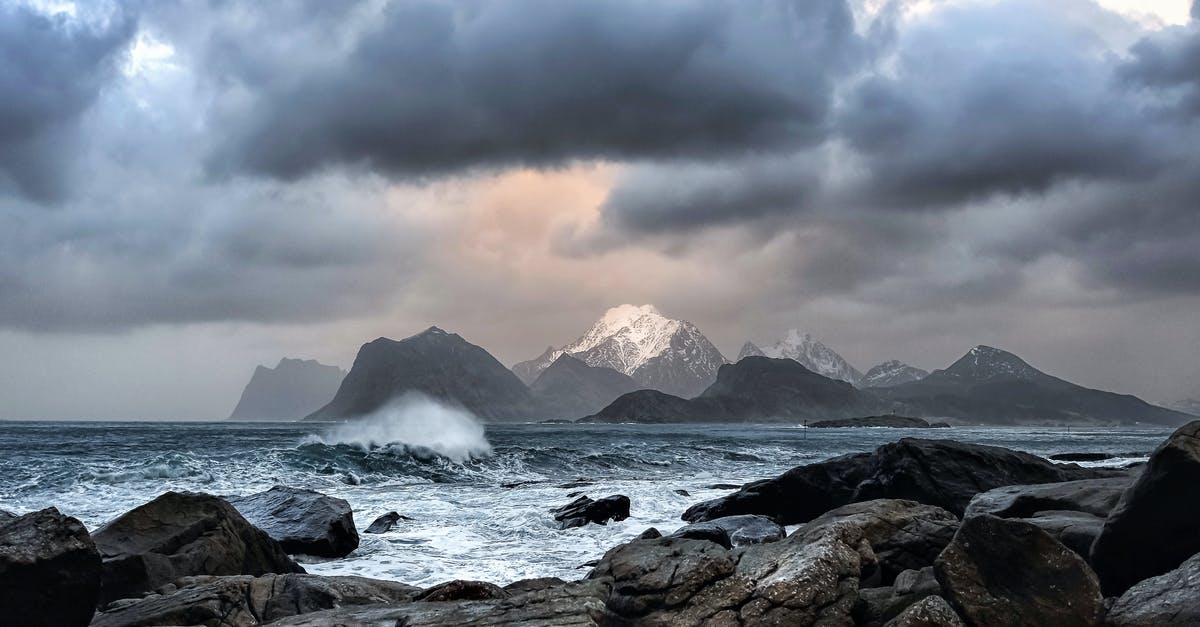 Arctic char available in North-America - Waves Crashing on Rock Near Mountains during Datyime