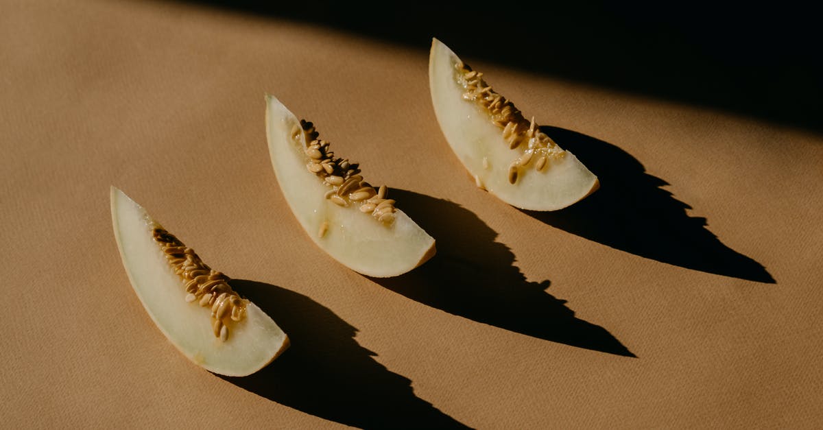 Are ash gourd / winter melon seeds edible? - Melon Slices on a Brown Surface 