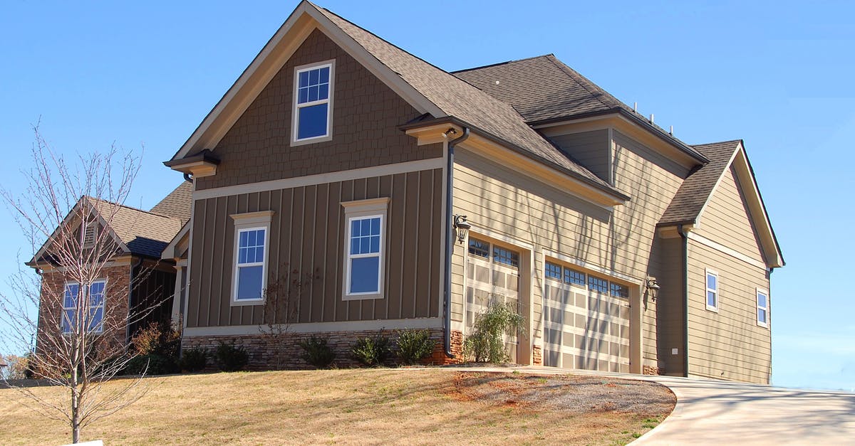 Are bubbling preserved lemons a sign of spoilage? - Brown and Beige Wooden House Under Blue Sky