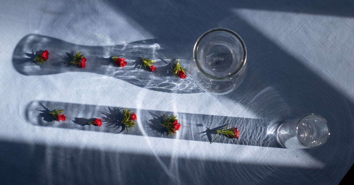 Are canned, unsweetened elderberries supposed to smell like blue cheese? - Red flower buds in shadows on blue surface