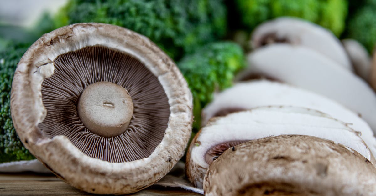 Are cremini mushrooms and chestnut mushrooms the same thing? - Brown and White Mushrooms on Brown Wooden Table