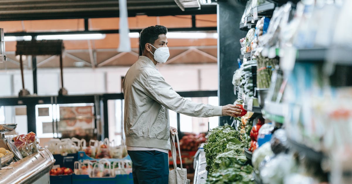 Are hardware store themocouples food safe? - Man in mask choosing fresh groceries in store