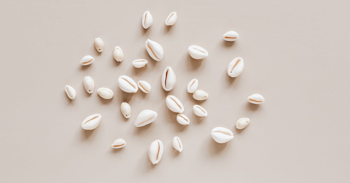 Are ladyfingers and Genoise made the same way? - Top view composition of shells assorted sizes arranged randomly on beige surface