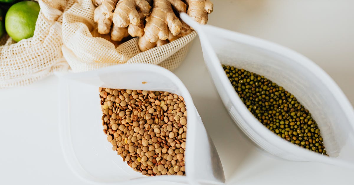 Are mung beans grown in Japan or North America? - High Angle Shot of Cereal and Beans inside of White Plastic