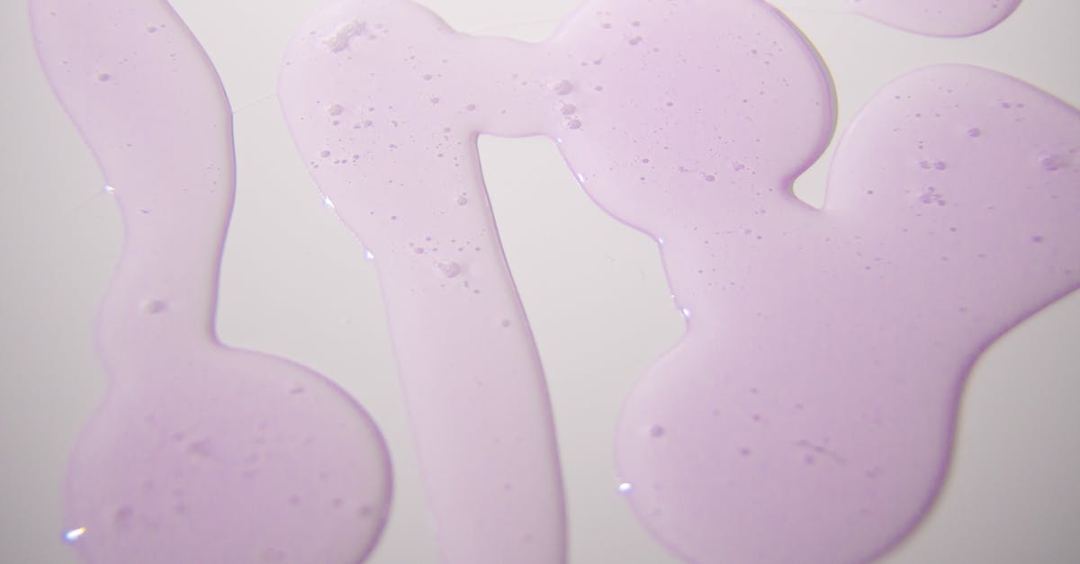 Are purple spots in freezer safe? - Abstract background of gel spilled on white surface