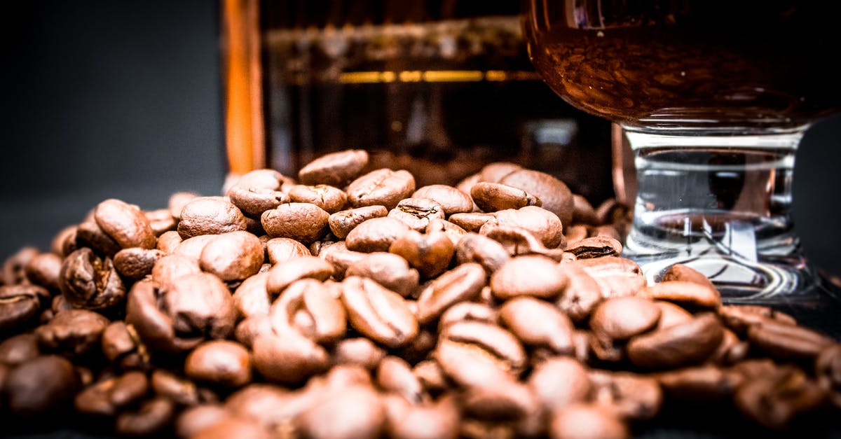 Are refried beans supposed to be slimy and nasty smelling? - Coffee beans with glass and French press on black background