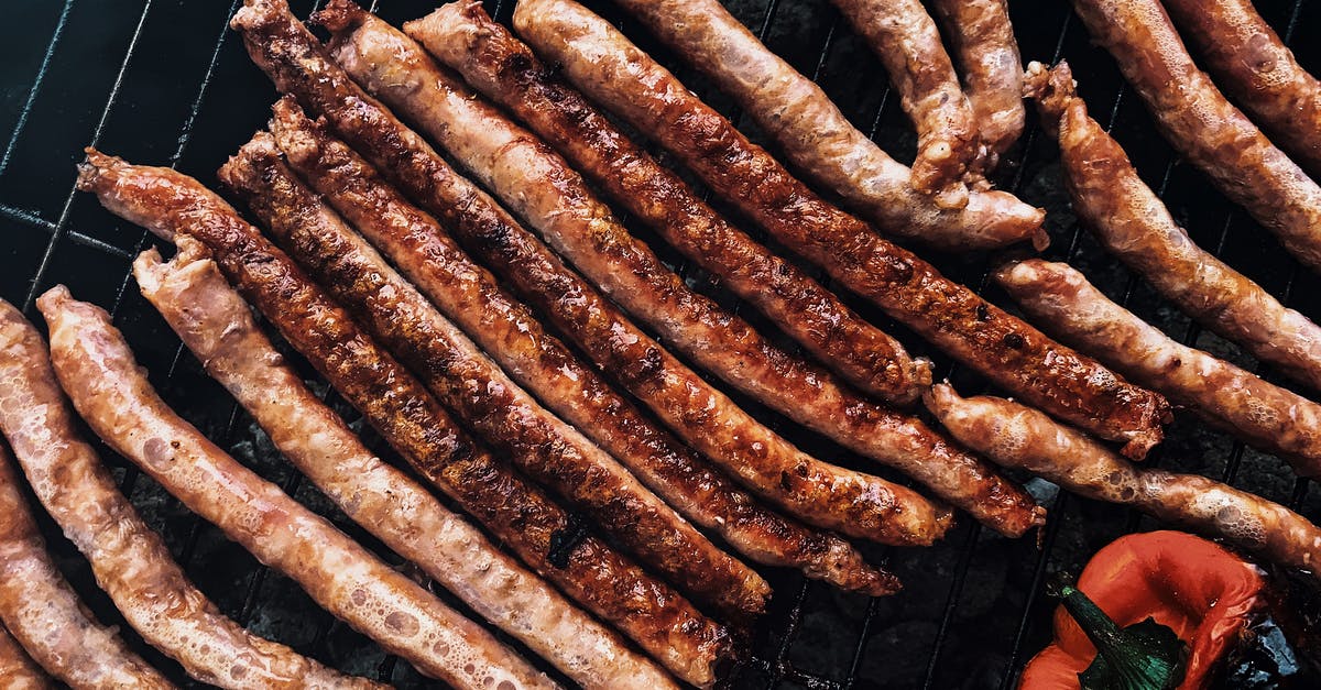 Are smoked pork chops from the butcher safe to eat without any further cooking? - Aromatic roasting sausages on barbecue grid