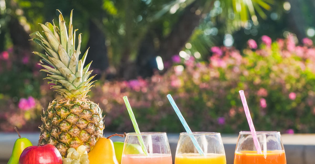 Are smoothies and milk shakes the same things with different names? - A Variety of Fruit Juices on a Table 