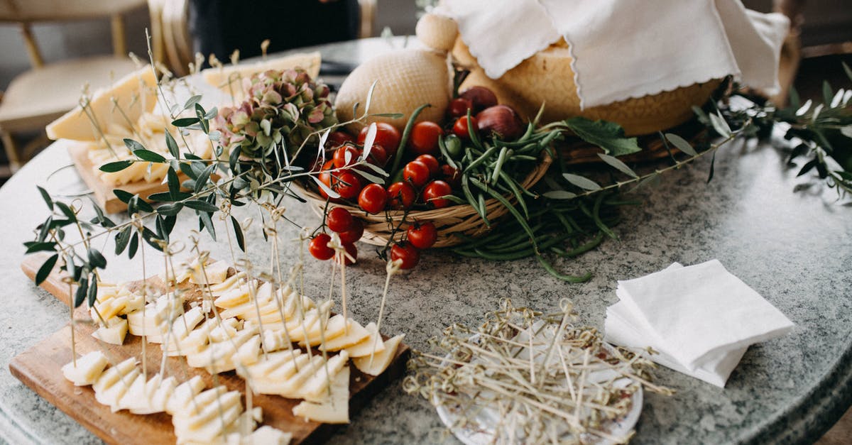 Are there cheeses with less saturated fat? - Finger Foods On Top Of A Grey Marble Table