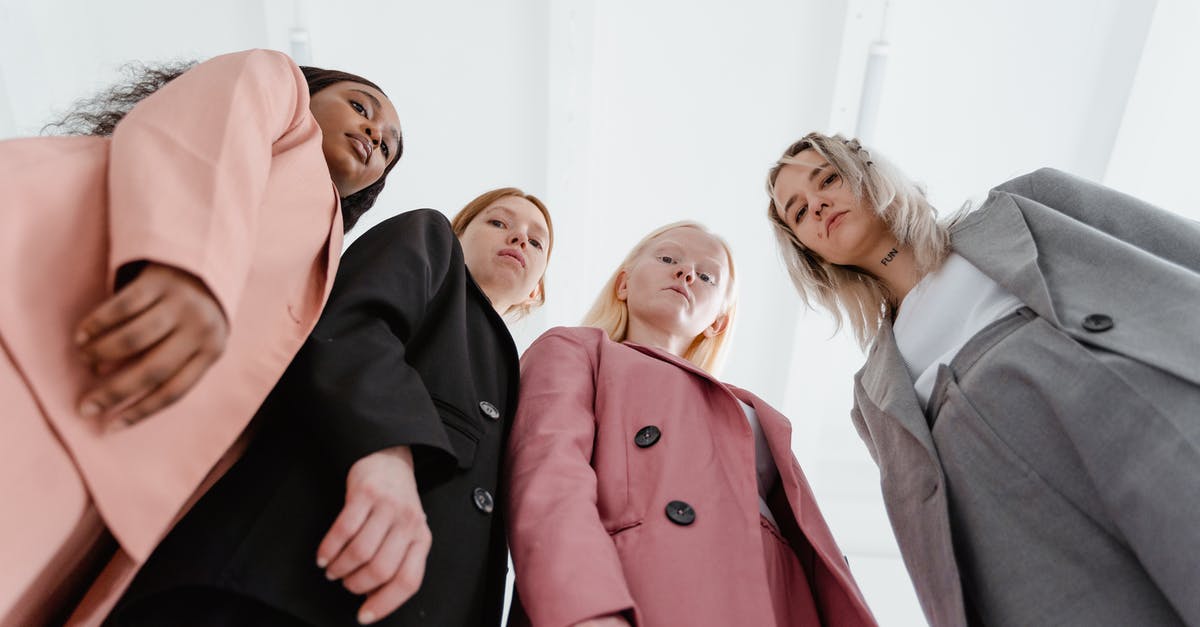 Are there different flavours of cumin? - 3 Women in Black and Pink Coat Standing Beside Woman in Brown Coat