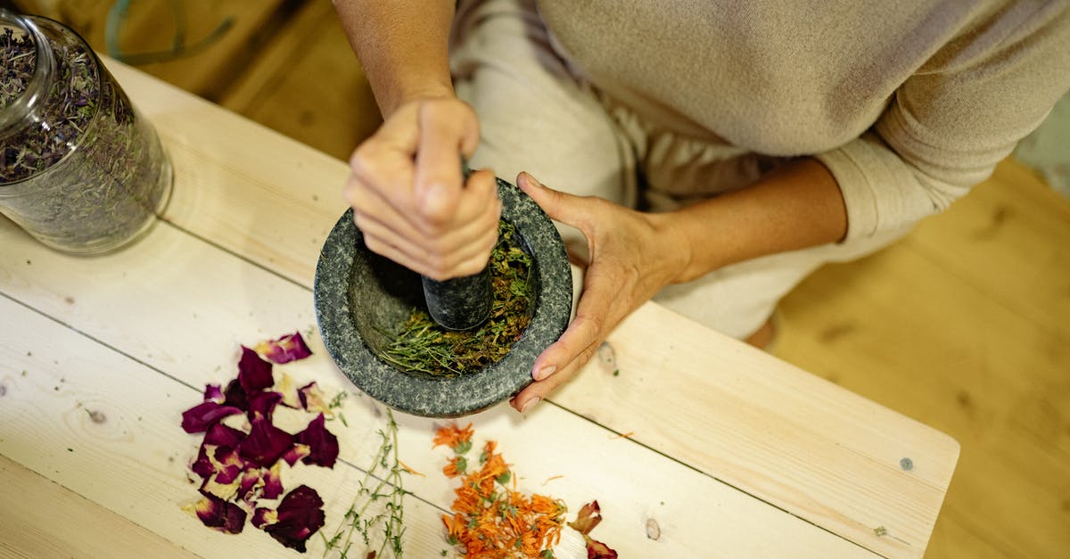 Are there substantial benefits to grinding your own flour? - Person Holding Green and Brown Plant