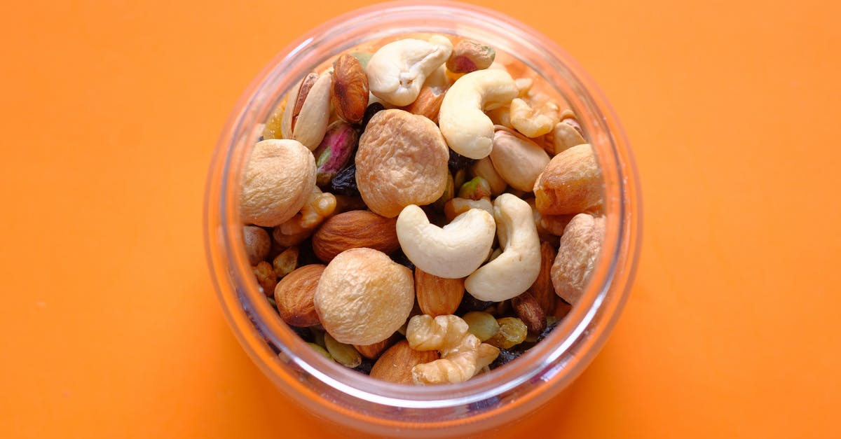 Are these cashew nuts mouldy? - Brown and White Stones in Clear Glass Bowl