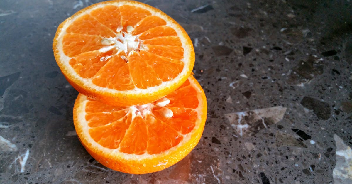 Are these vestigial seeds in a "seedless" orange? - Sliced Orange Fruit