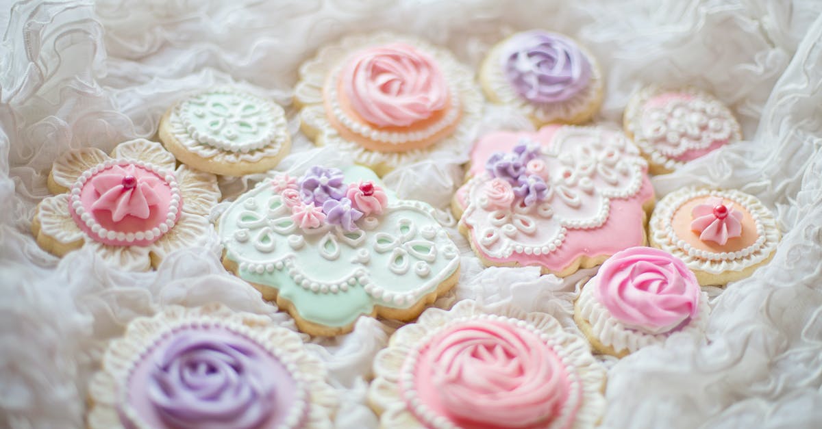 Art of making delicate French butter cookies (Madeleines) - Cookies with Beautiful Design on White Cloth