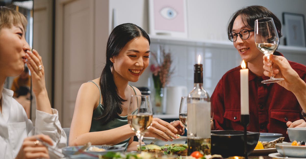 Asian toasting seeds - People Eating and Dining Together 