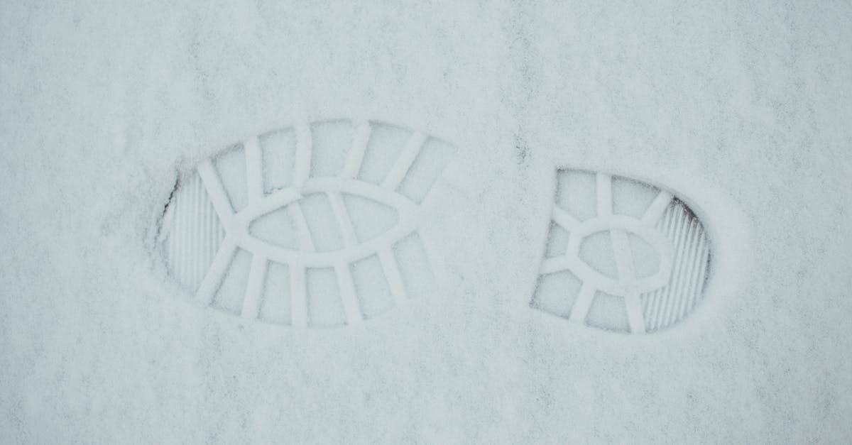 At what temperature does simple syrup freeze? - From above of textured background of footprint on ground covered with snow in winter day