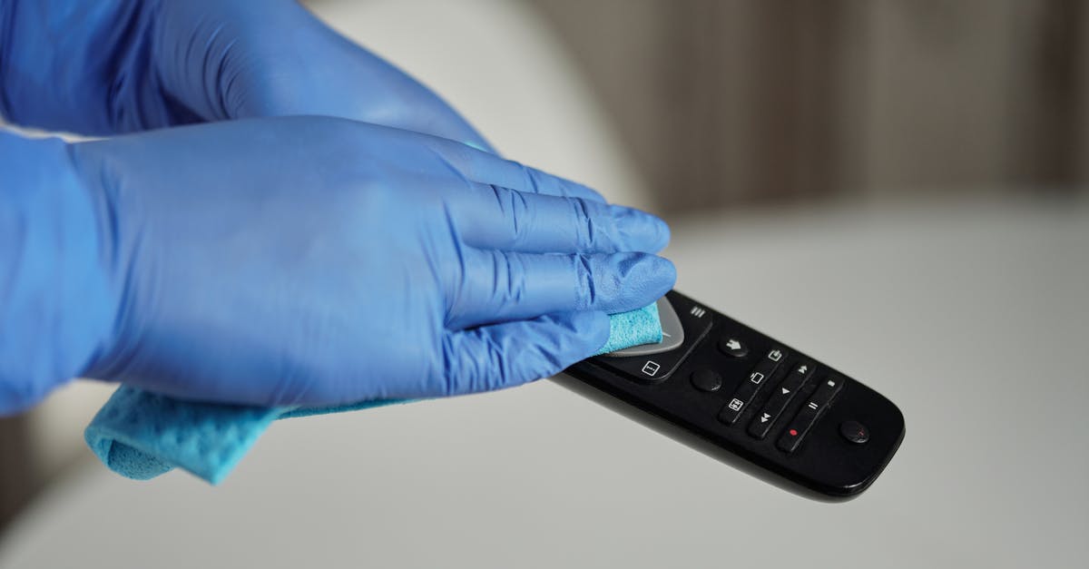 Avoiding foodborne botulism - Person Holding Black Remote Control