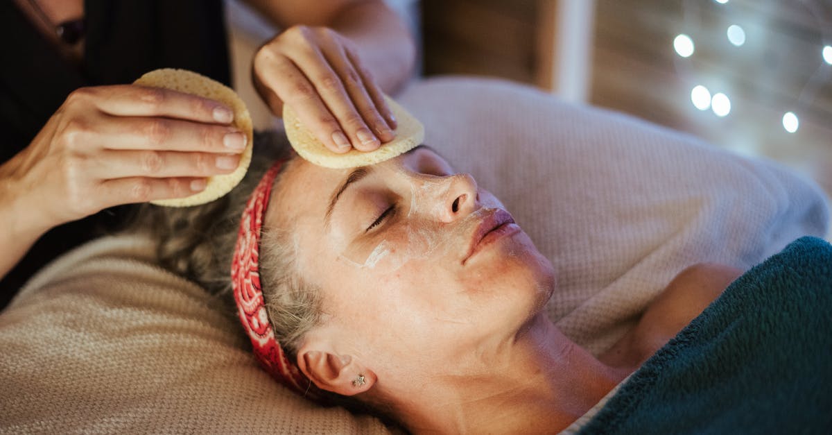 Bagel Sponge: Room Temp or Proofing Temp? - Woman removing mask from face after massage