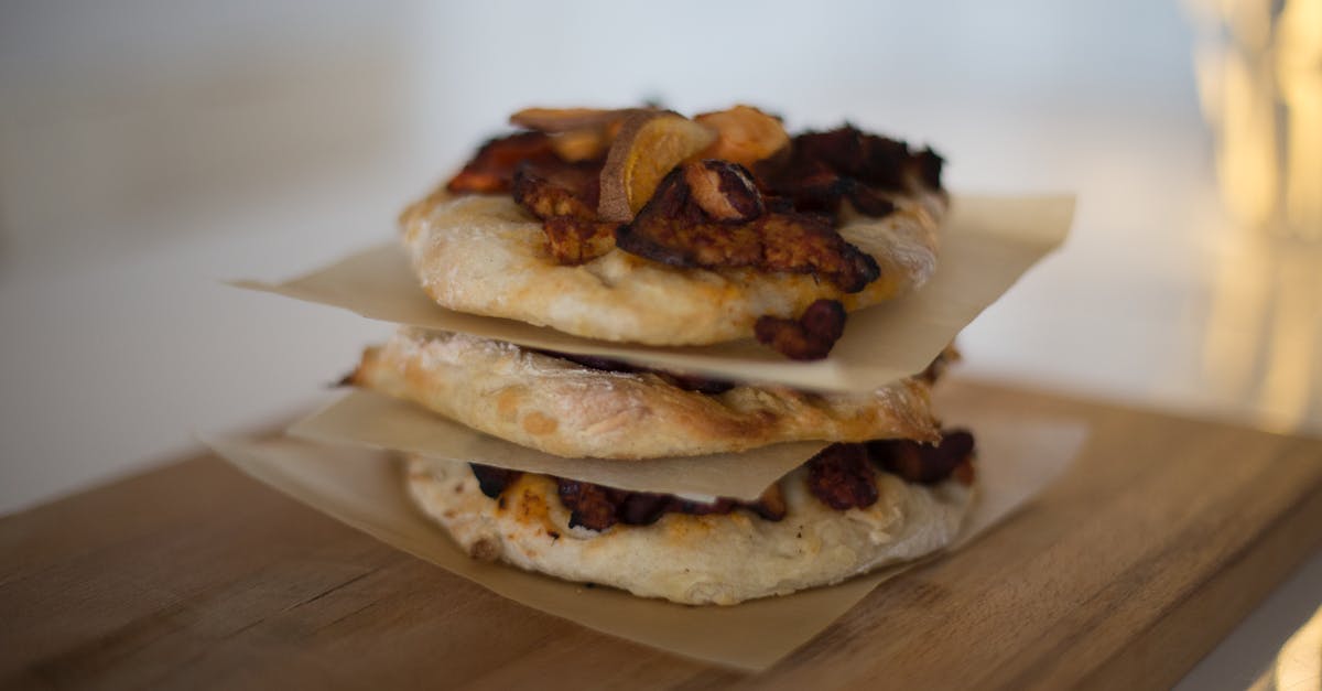 Bagels: Alternative to cornmeal on the baking sheet? - Stack of Pies on Brown Wooden Panel in Tilt Shift Lens