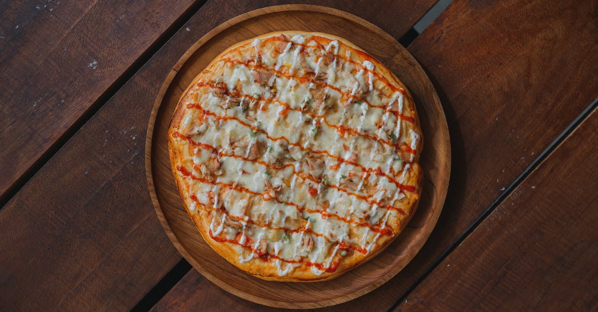 Bake frozen pizza without a tray - will it melt and drip? - Pizza on Food Tray