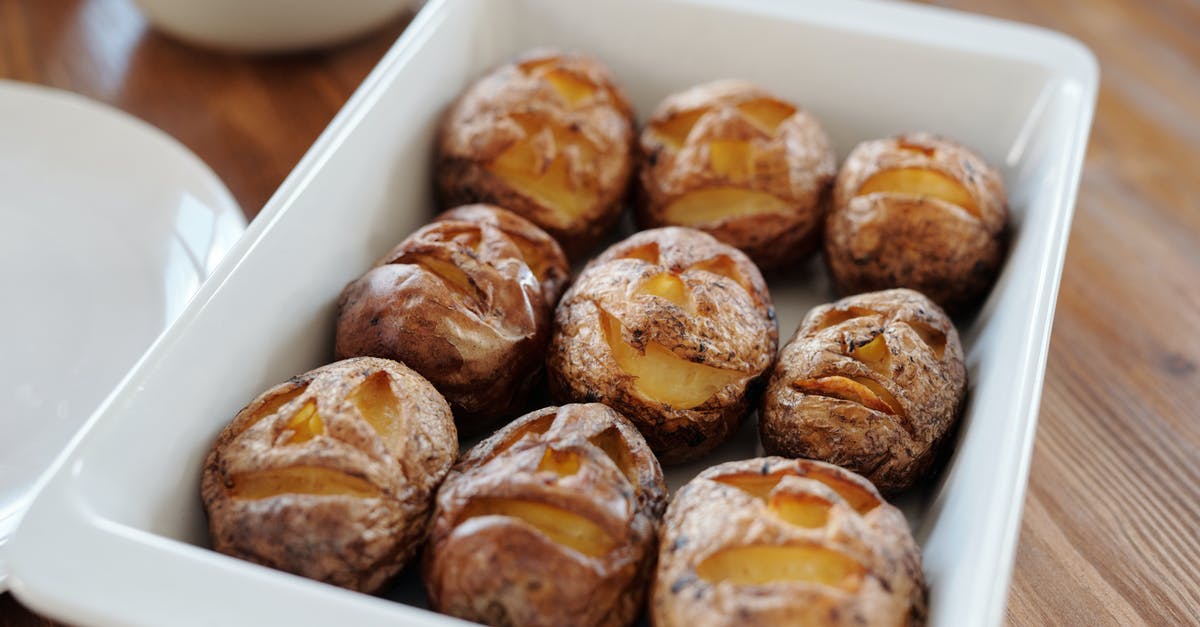 Baked sweet potato skin hard as a rock - Carved Potatoes In A Ceramic Tray